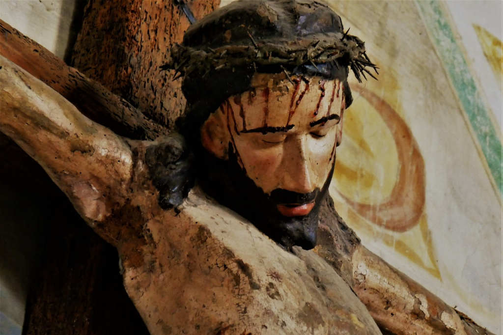 painting of Jesus bearing the cross