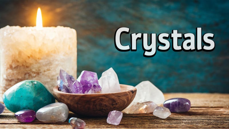 crystal mineral collection on wooden table text